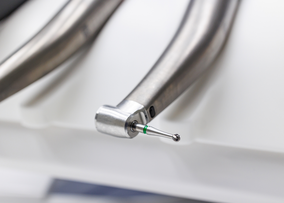 Rotary endodontic system for safe, controlled tooth disinfection